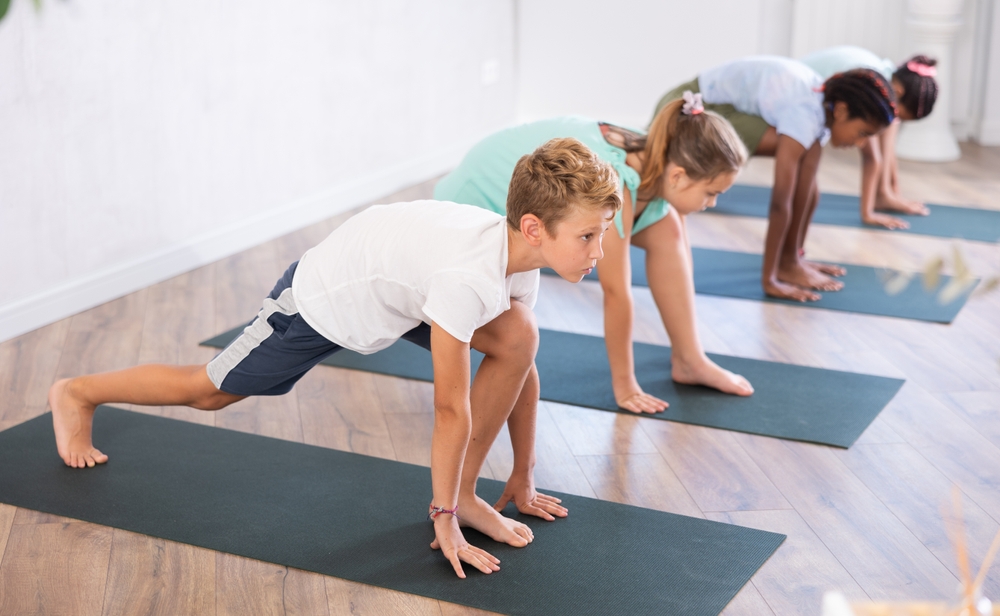 Kids Stretching on Yoga Mats