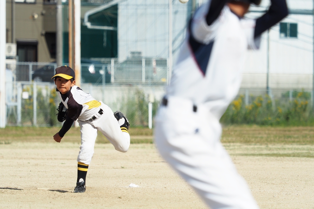 Youth Baseball Player Throwing a Pitch