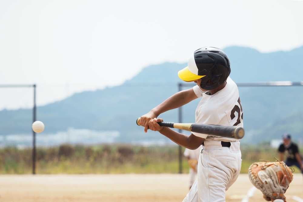 Youth Baseball Player About to Swing