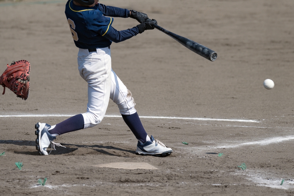 Youth Baseball Player Getting a Hit