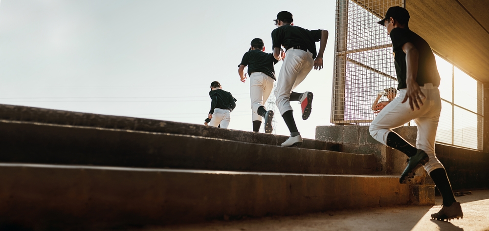 Youth Baseball Players Heading to the Field